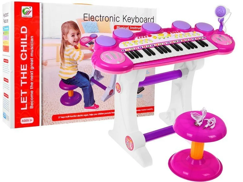 Ružičasti glazbeni set s klavijaturom, bubnjem i mikrofonom 3+_1